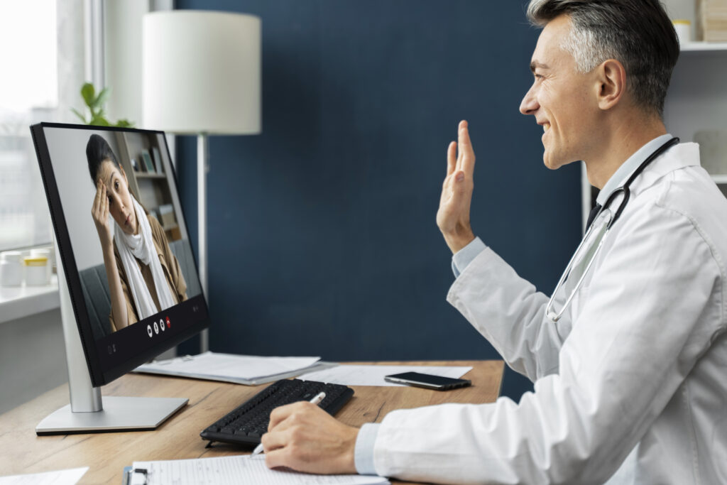 doctor on video call with patient