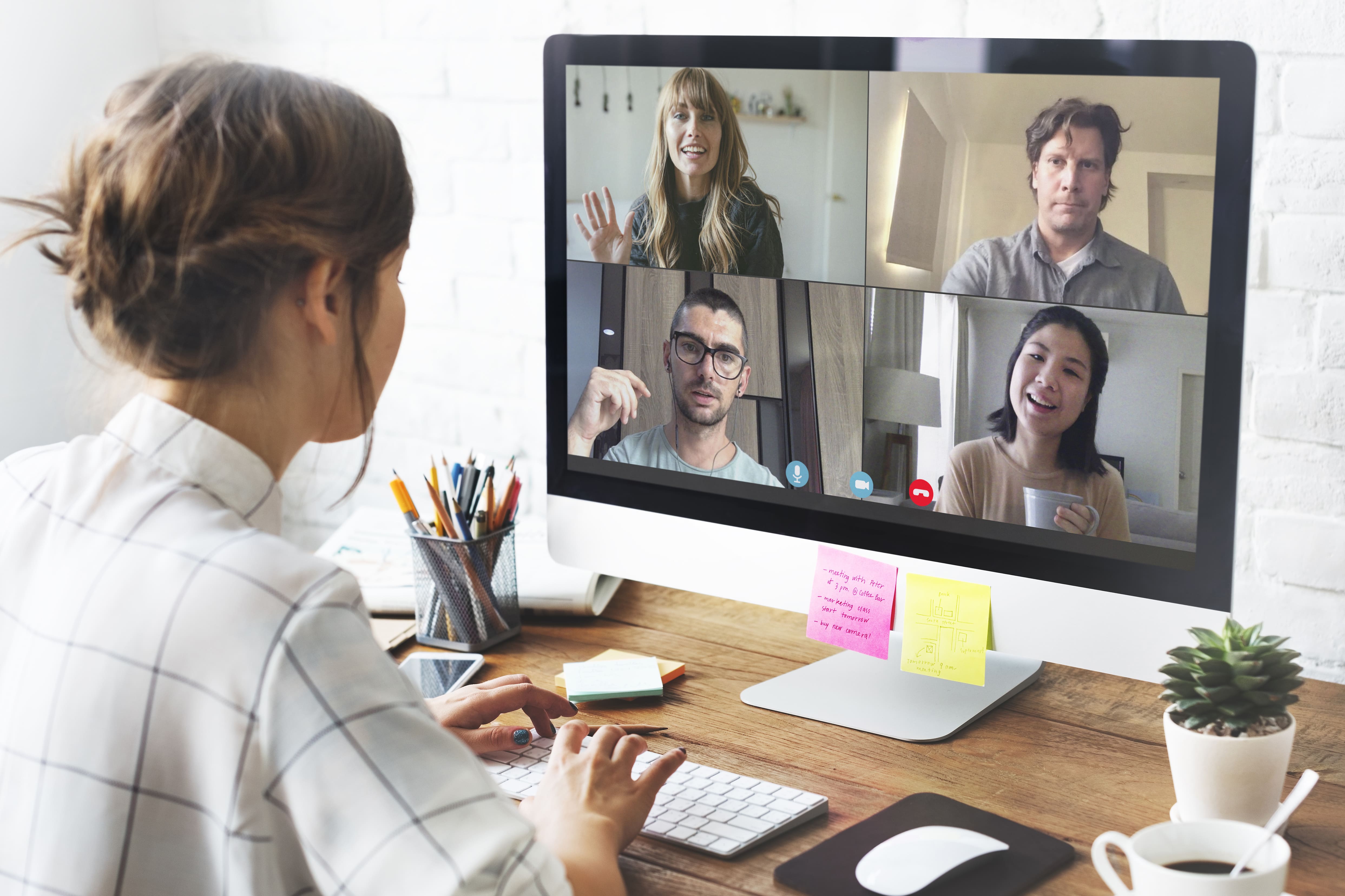 women on video conferencing with colleague